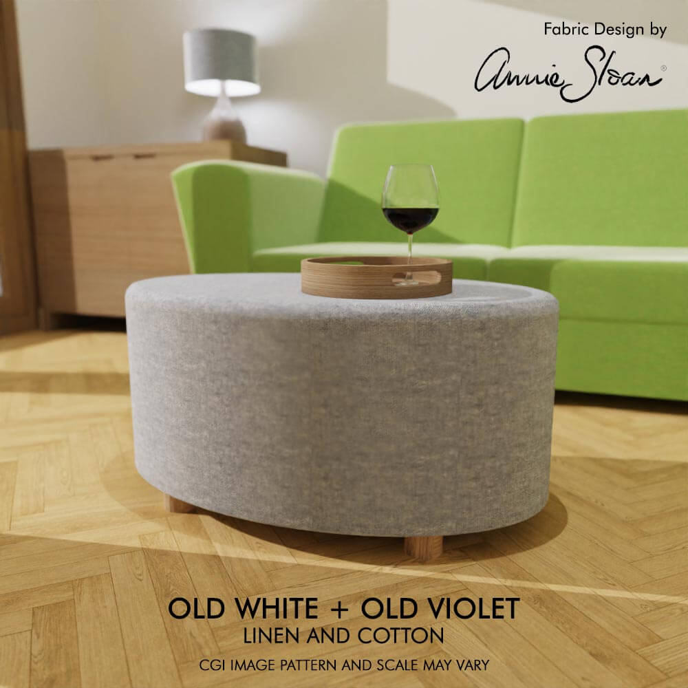 Oval coffee table footstool draped in fabric from Annie Sloan's linen union range Old White and Old Violet, epitomizing casual elegance and comfort.