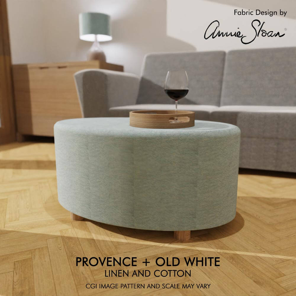 Oval coffee table footstool upholstered in Annie Sloan's Provence and Old White, exuding a vintage-inspired elegance.